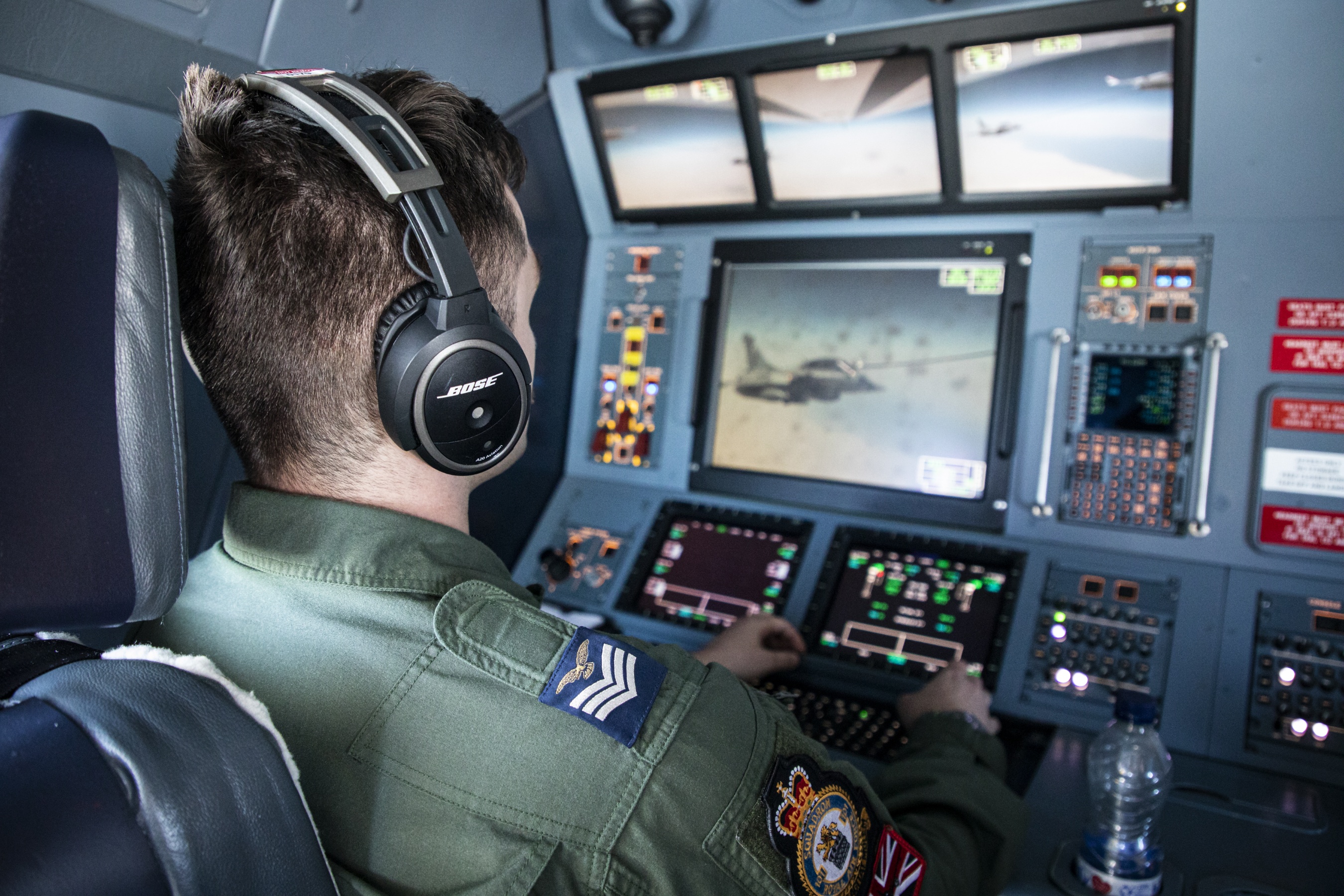 Aviator in cockpit.